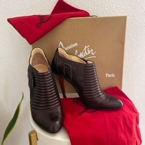 CHRISTIAN LOUBOUTIN Leather Booties metallic brown. 4 inch heel, motto design.
